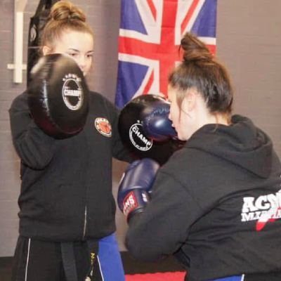 Women practicing self-defence